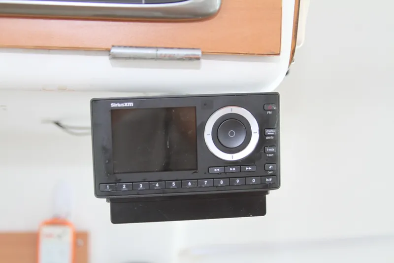 Slide: The Image of SiriusXM radio unit in a 2004 Lagoon 380 yacht interior. - 29