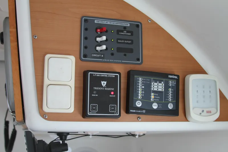 Slide: The Image of Control panel of a 2004 Lagoon 380 catamaran with electrical and gas systems. - 31