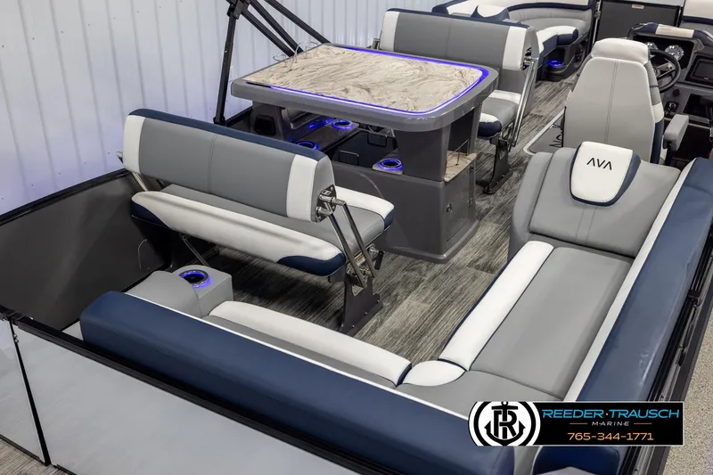 Slide: The Image of Luxurious interior of 2025 Avalon Catalina Entertainer pontoon boat with stylish seating and table. - 12