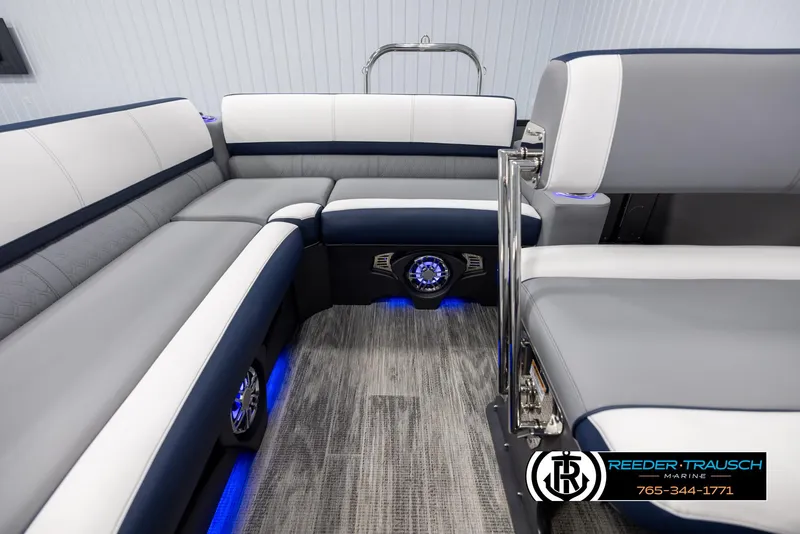 Slide: The Image of Luxurious interior of 2025 Avalon Catalina Entertainer boat with modern seating and ambient lighting. - 15