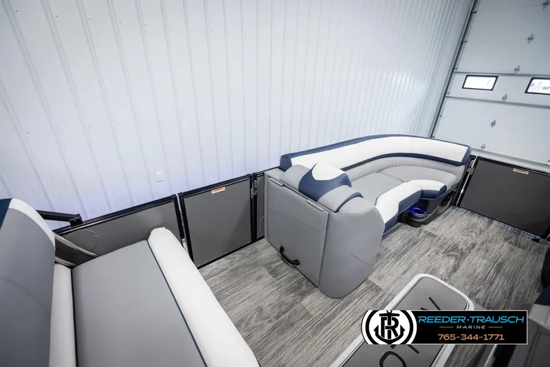 Slide: The Image of 2025 Avalon Catalina Entertainer boat interior with modern seating and flooring. - 20