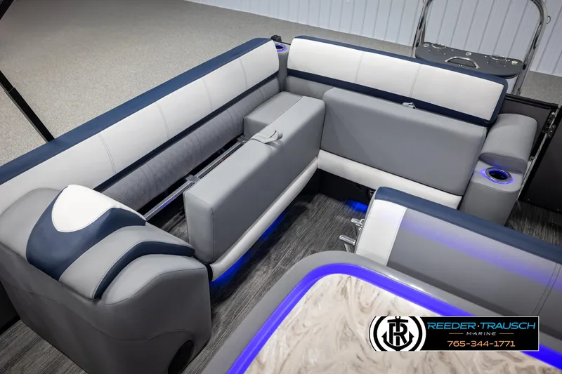 Slide: The Image of Luxurious seating in 2025 Avalon Catalina Entertainer boat with modern design and blue accents. - 23