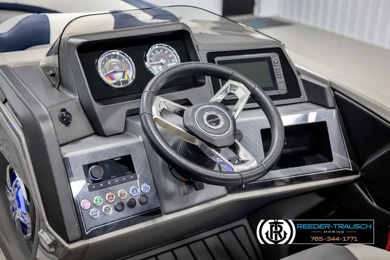 Slide: The Image of 2025 Avalon Catalina Entertainer dashboard with steering wheel and control panel. - 28
