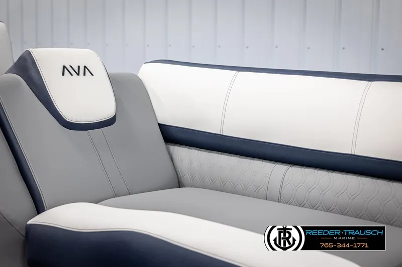 Slide: The Image of Luxurious seating in 2025 Avalon Catalina Entertainer boat, featuring elegant gray and white upholstery. - 34