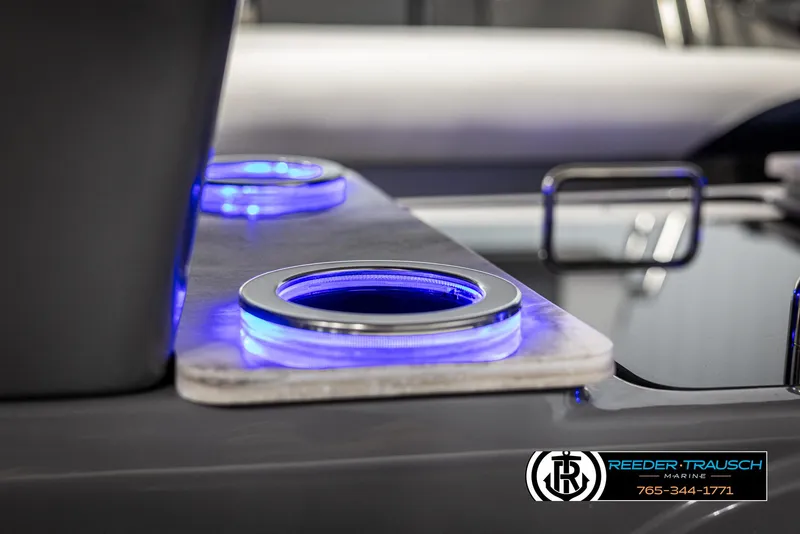 Slide: The Image of 2025 Avalon Catalina Entertainer with illuminated cup holders, Reeder-Trausch Marine branding. - 37