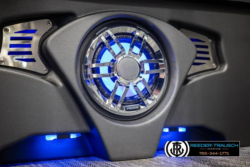 Slide: The Image of 2025 Avalon Catalina Entertainer speaker with blue LED lighting, Reeder-Trausch Marine branding. - 39