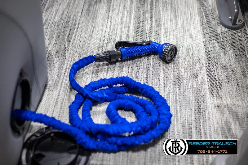 Slide: The Image of Blue hose on Avalon Catalina Entertainer 2025 boat deck, Reeder-Trausch Marine logo visible. - 41