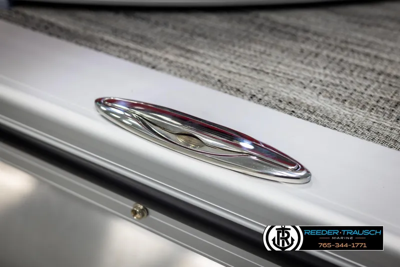 Slide: The Image of 2025 Avalon Catalina Entertainer boat detail with sleek chrome handle. - 49