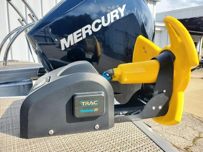 Slide: The Image of TRAC Pontoon 35 anchor winch and Mercury engine on 2021 Godfrey Monaco 235RL boat. - 17