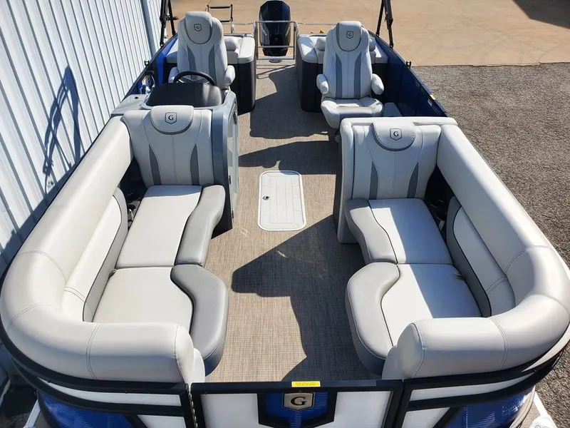 Slide: The Image of 2021 Godfrey Monaco 235RL triple tube pontoon boat with luxurious seating and spacious layout. - 2
