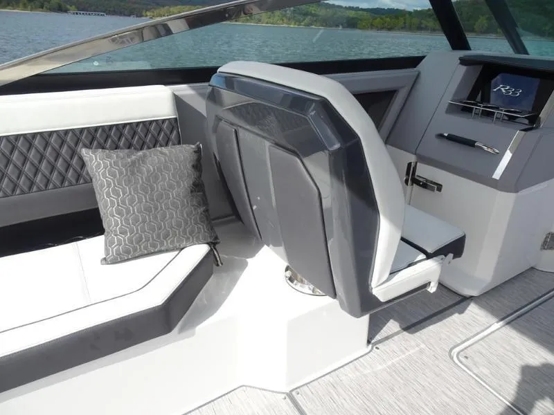 Slide: The Image of Luxurious interior of 2025 Cobalt R33 boat with modern seating and elegant design. - 18