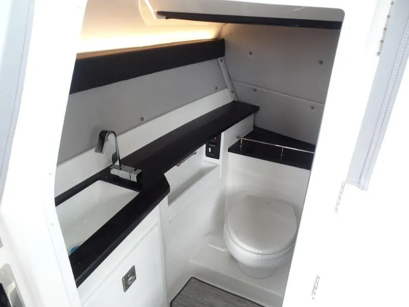 Slide: The Image of Modern bathroom in 2025 Cobalt R33 boat with sleek design and fixtures. - 20