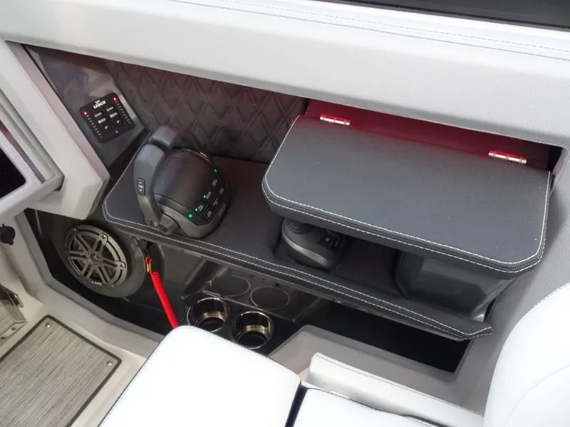 Slide: The Image of 2025 Cobalt R33 interior with modern controls and storage compartments. - 26