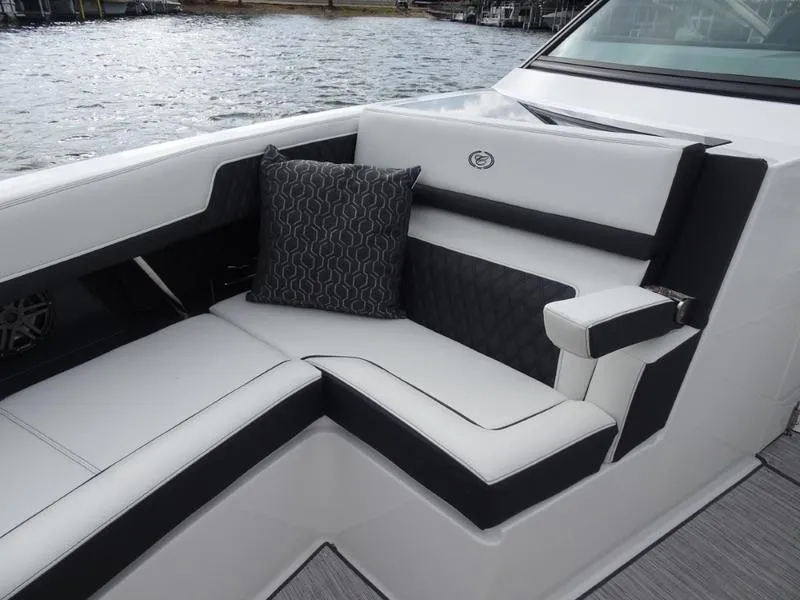 Slide: The Image of Luxurious seating on 2025 Cobalt R33 boat with elegant black and white upholstery. - 33
