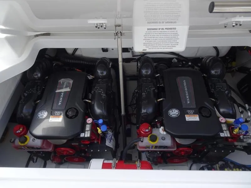 Slide: The Image of Twin engines in a 2025 Cobalt R33 boat, showcasing powerful marine engineering. - 37