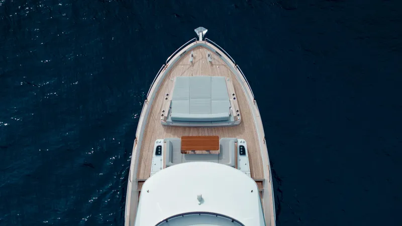 Slide: The Image of Aerial view of 2023 Sirena 68 yacht on deep blue water. - 18