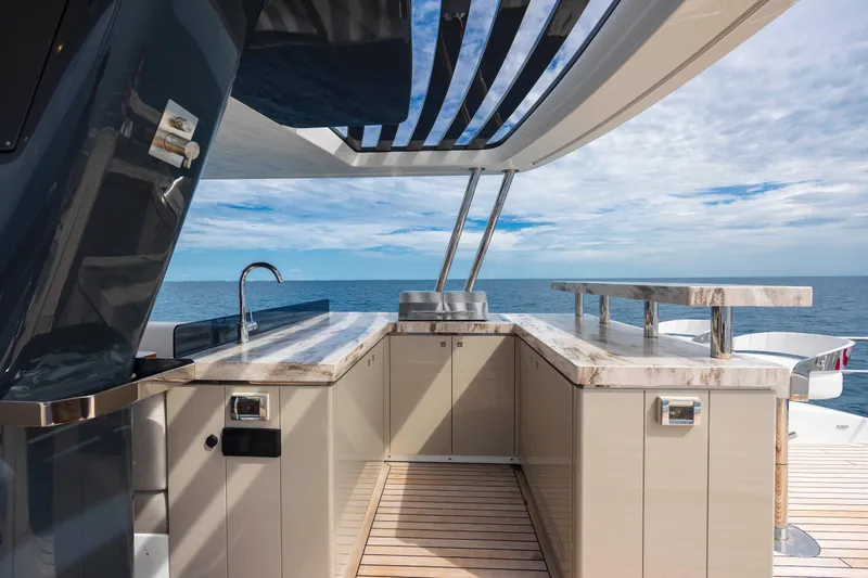 Slide: The Image of Luxurious outdoor kitchen on 2023 Sirena 68 yacht with ocean view. - 28