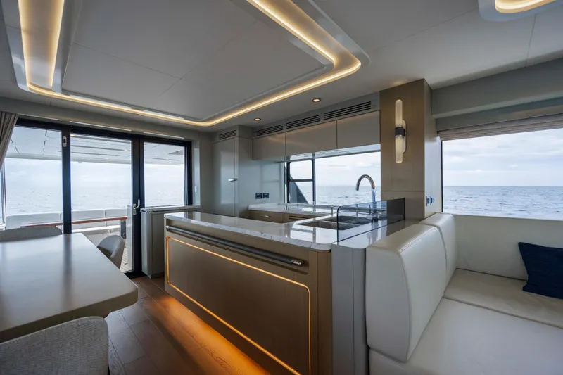 Slide: The Image of Luxurious interior of 2023 Sirena 68 yacht with modern kitchen and ocean view. - 33