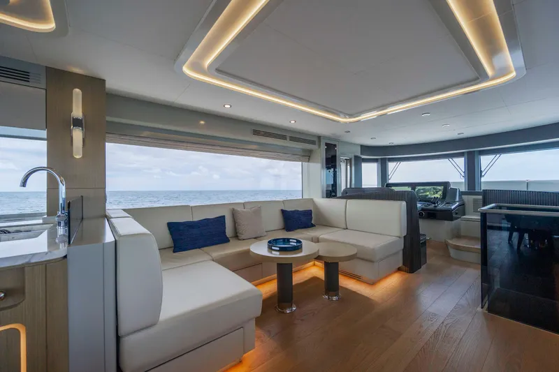 Slide: The Image of Luxurious interior of 2023 Sirena 68 yacht with modern seating and ocean view. - 35