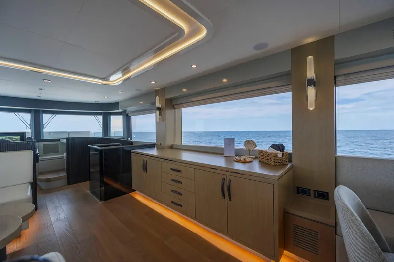Slide: The Image of Luxurious interior of 2023 Sirena 68 yacht with ocean view and modern design. - 36