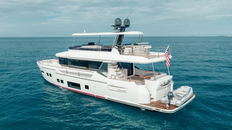 Slide: The Image of Luxury Sirena 68 yacht cruising on open sea, 2023 model. - 4
