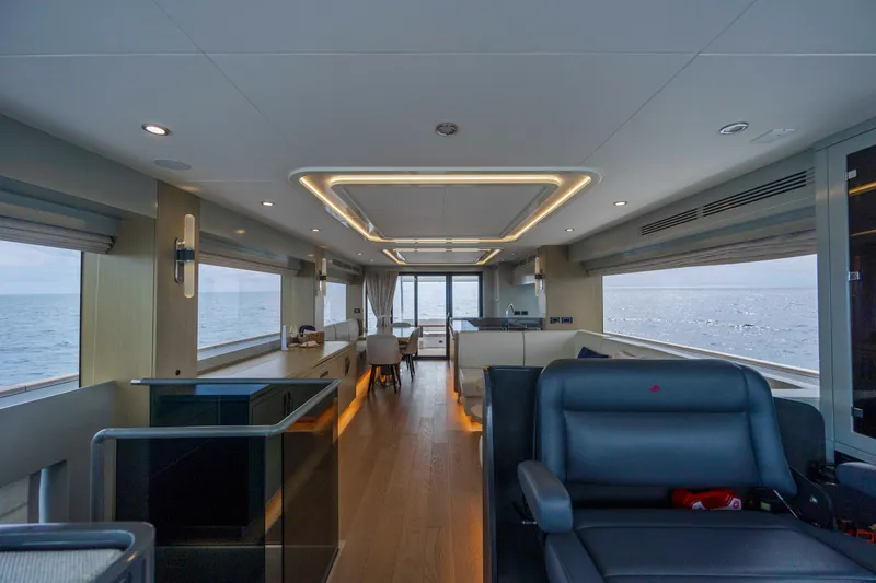 Slide: The Image of Luxurious interior of 2023 Sirena 68 yacht with modern design and ocean view. - 40