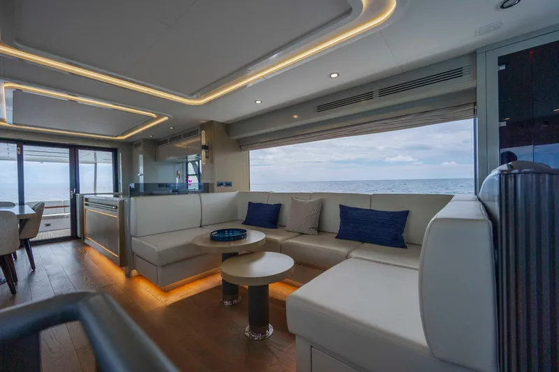 Slide: The Image of Luxurious interior of 2023 Sirena 68 yacht with ocean view and modern seating. - 41