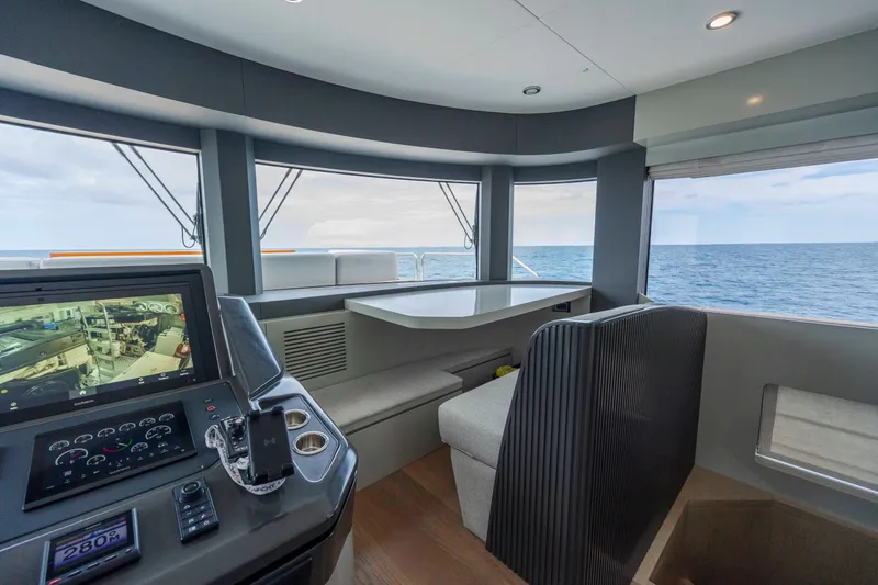 Slide: The Image of Interior of 2023 Sirena 68 yacht with ocean view and modern navigation equipment. - 43