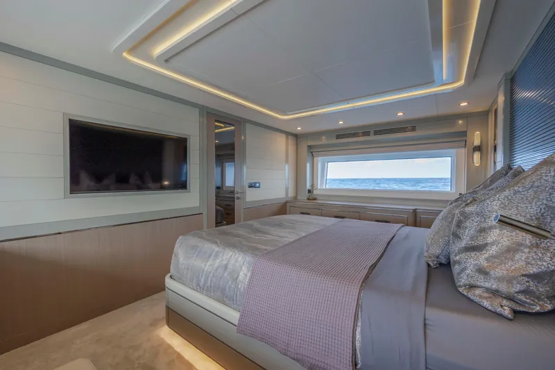 Slide: The Image of Luxurious bedroom interior of 2023 Sirena 68 yacht with ocean view and modern design. - 46