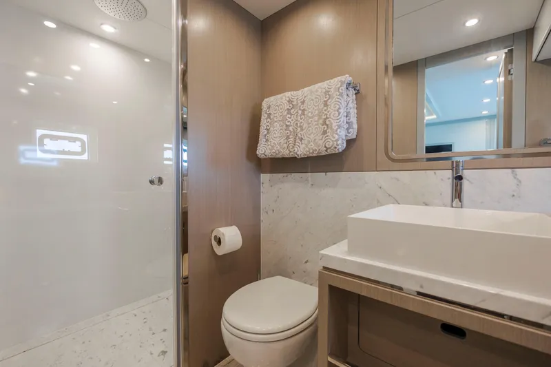 Slide: The Image of Luxurious bathroom in 2023 Sirena 68 yacht with modern fixtures and elegant design. - 49