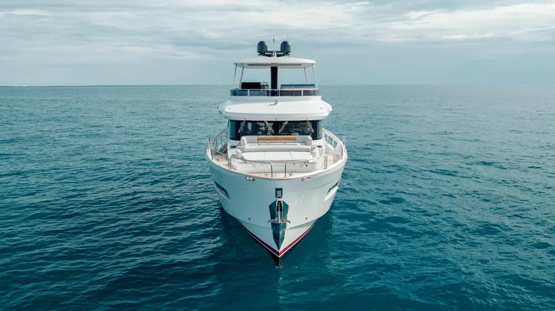 Slide: The Image of Front view of 2023 Sirena 68 yacht on open sea. - 5