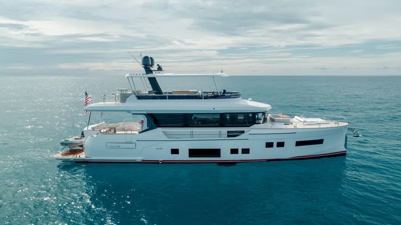 Slide: The Image of Luxury Sirena 68 yacht cruising on open sea, 2023 model. - 7