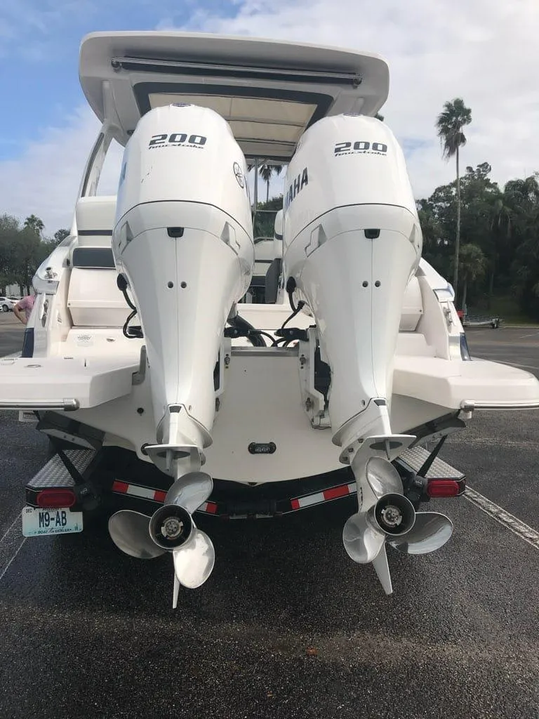 Slide: The Image of 2017 Regal 29 OBX boat with twin Yamaha 200 engines, rear view. - 3