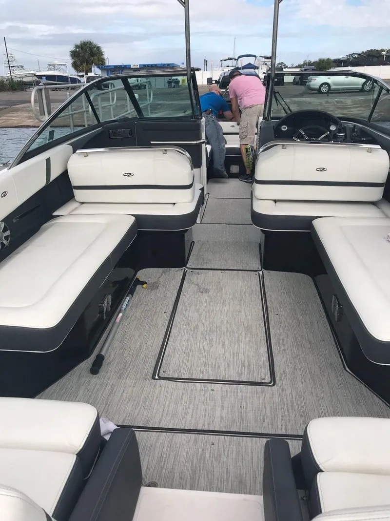 Slide: The Image of 2017 Regal 29 OBX boat interior with spacious seating and modern design. - 8