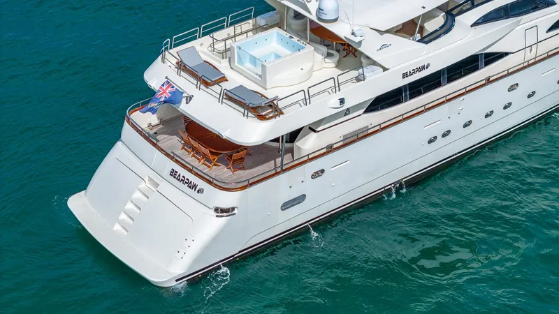 Slide: The Image of Azimut 100 Jumbo yacht, 2000 model, cruising on clear blue water. - 25