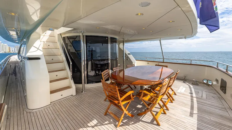 Slide: The Image of Luxury yacht Azimut 100 Jumbo 2000, featuring elegant outdoor dining area with ocean view. - 47