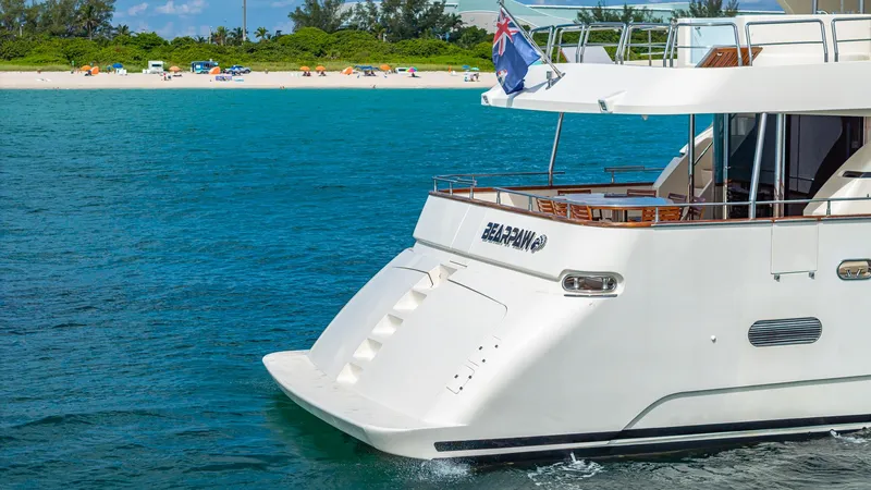 Slide: The Image of Luxury Azimut 100 Jumbo yacht cruising near a sandy beach, 2000 model. - 49