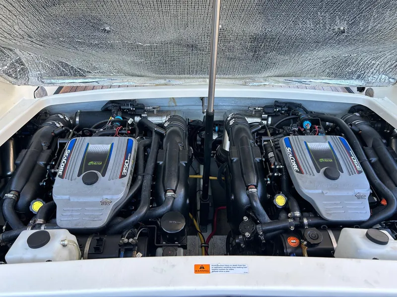 Slide: The Image of 2015 Chris-Craft Launch 28 engine compartment with twin engines. - 22
