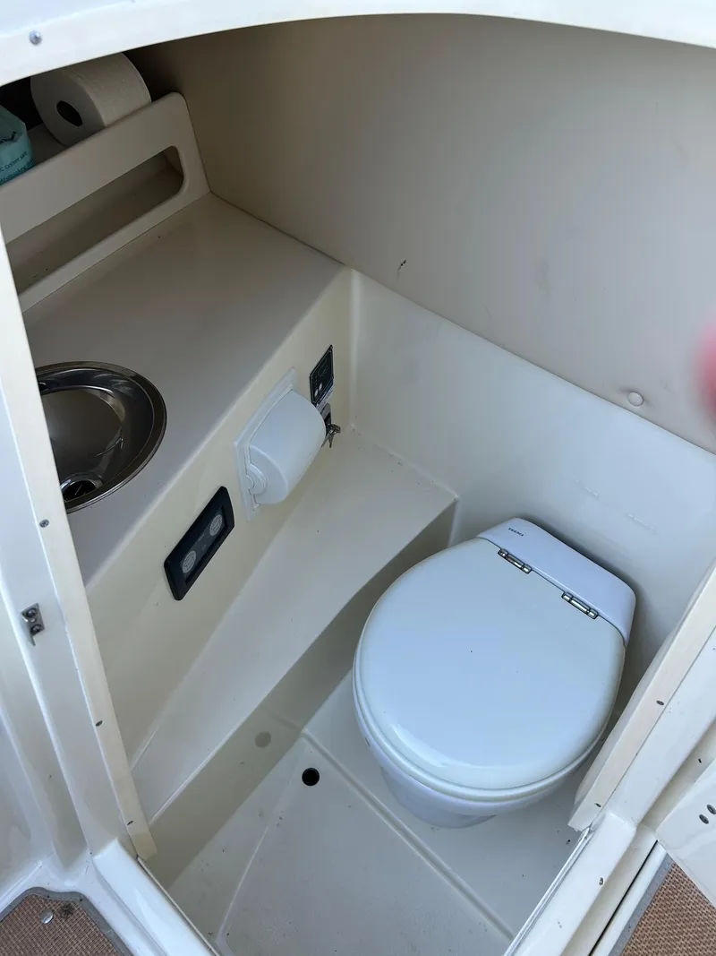 Slide: The Image of 2015 Chris-Craft Launch 28 boat bathroom with toilet and sink. - 23