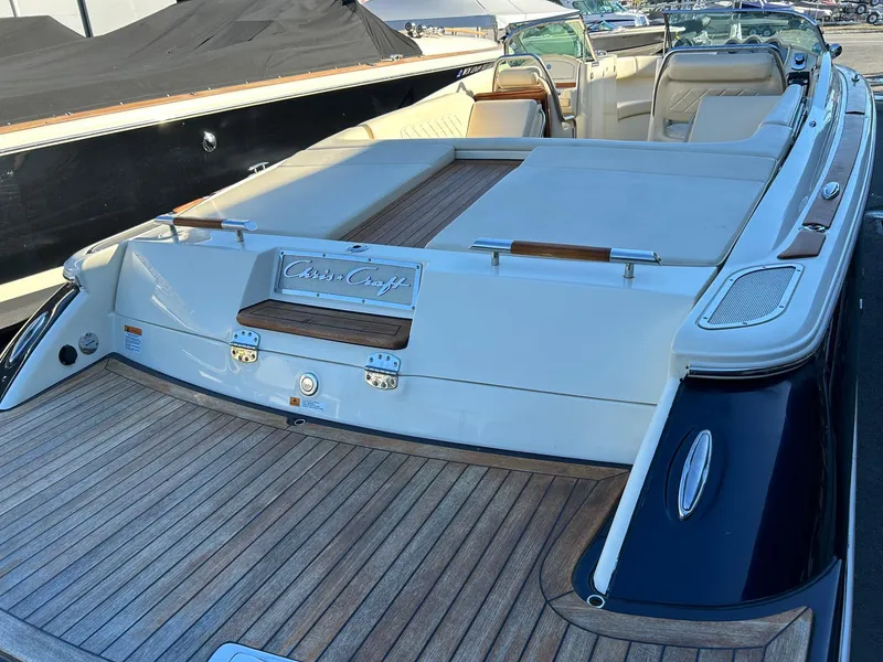 Slide: The Image of 2015 Chris-Craft Launch 28 boat with spacious deck and elegant seating. - 7