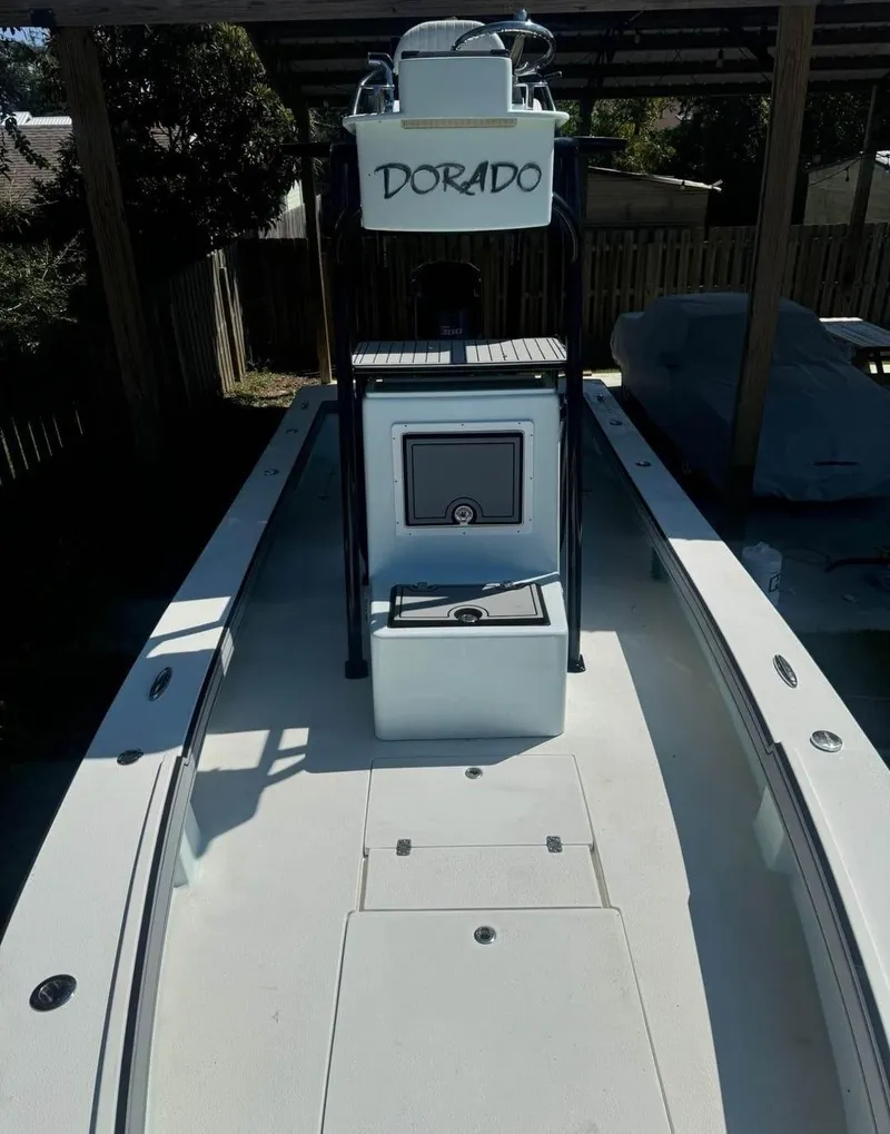 Slide: The Image of 2019 Dorado 25 Flat Deck boat with center console and spacious deck. - 7