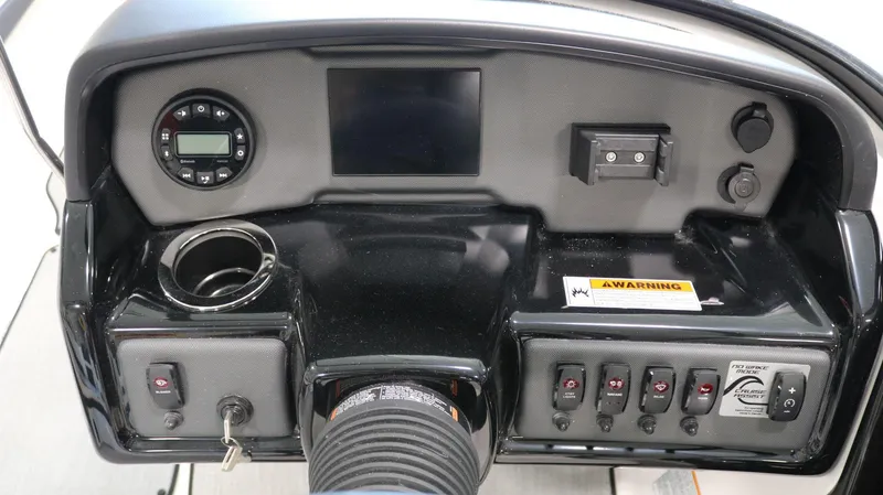 Slide: The Image of Dashboard of 2025 Yamaha Boats AR195 with controls and display panel. - 20