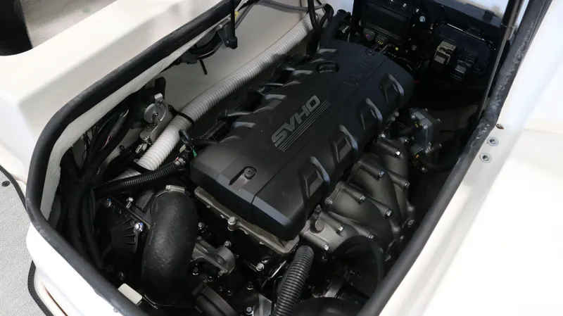 Slide: The Image of 2025 Yamaha AR195 boat engine compartment with SVHO engine detail. - 24