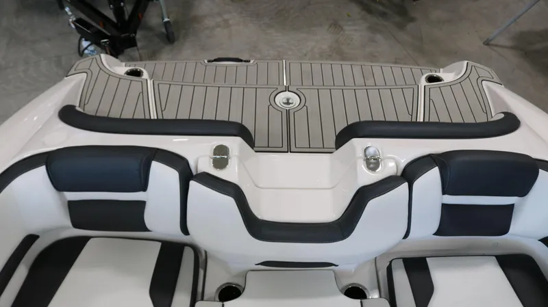 Slide: The Image of 2025 Yamaha Boats AR195 interior with sleek seating and modern design. - 25