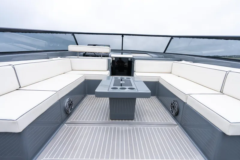 Slide: The Image of Luxurious 2023 VanDutch 48 yacht interior with sleek seating and modern design. - 15