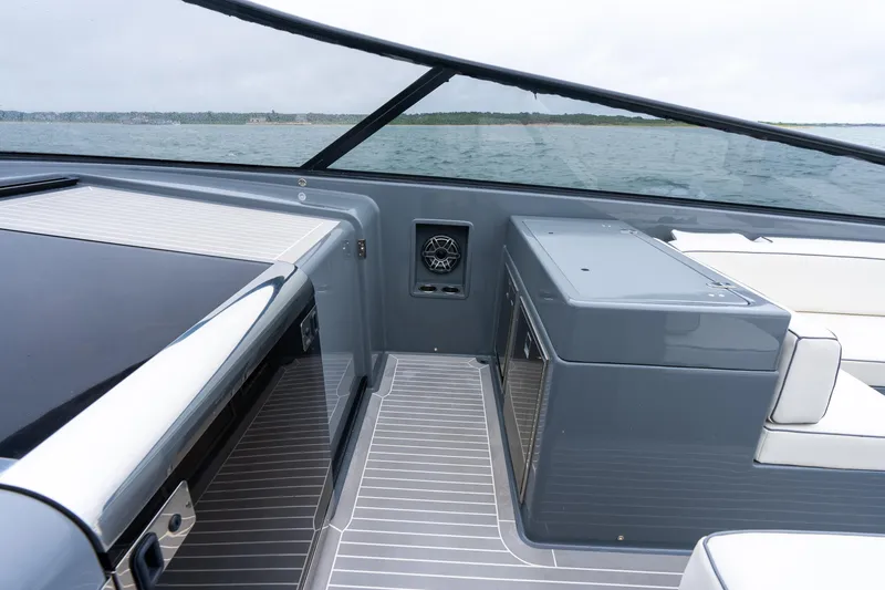 Slide: The Image of 2023 VanDutch 48 yacht interior with sleek design and modern amenities on open water. - 21