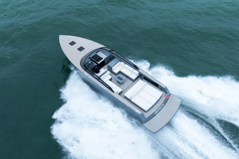 Slide: The Image of 2023 VanDutch 48 yacht cruising on open water, showcasing sleek design and luxury. - 6