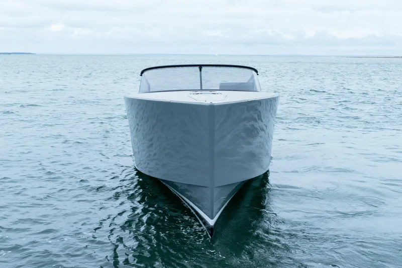 Slide: The Image of 2023 VanDutch 48 yacht on open water, showcasing sleek design and modern elegance. - 7