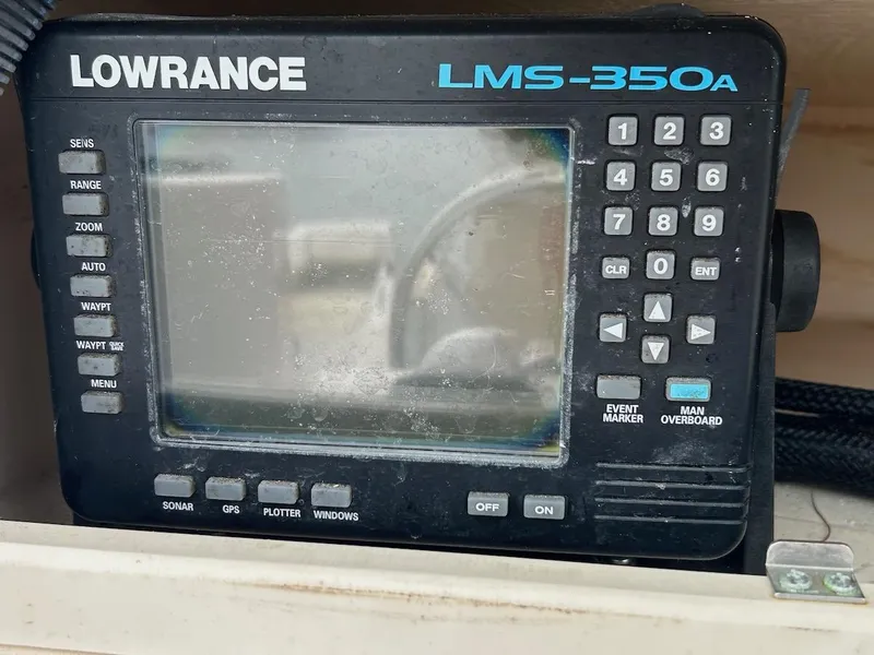 Slide: The Image of Lowrance LMS-350A marine GPS device on a 1993 Grady-White 24 Explorer boat. - 14
