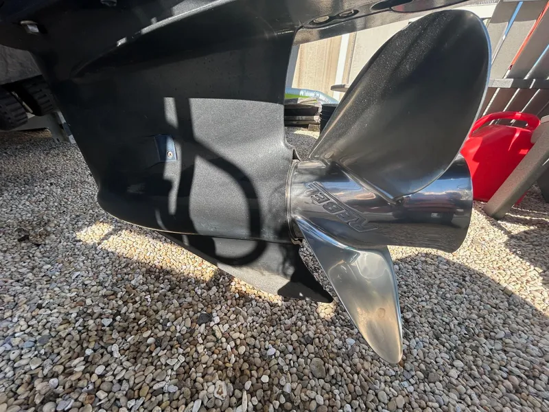 Slide: The Image of Propeller of 1993 Grady-White 24 Explorer boat on gravel surface. - 35